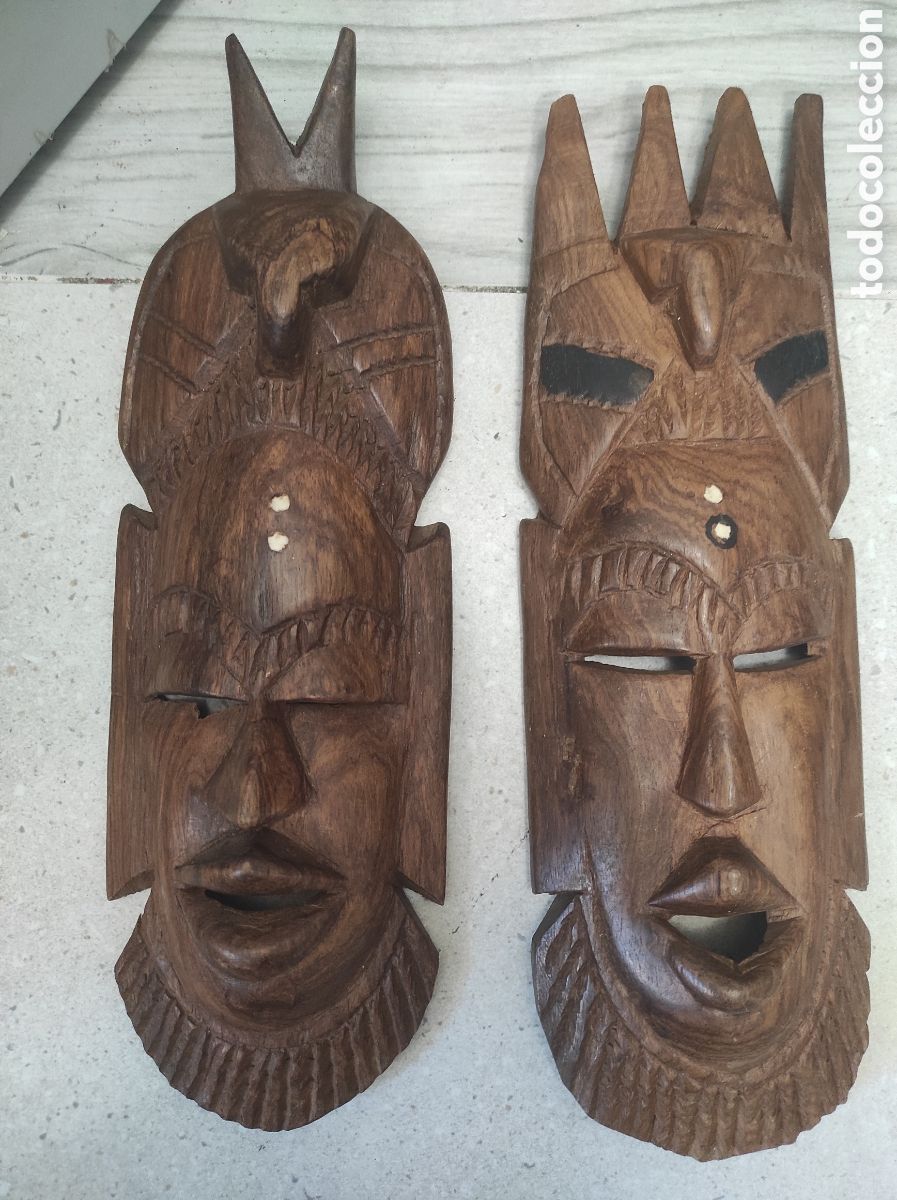 Arte: Pareja de m&aacute;scaras africanas talladas en madera