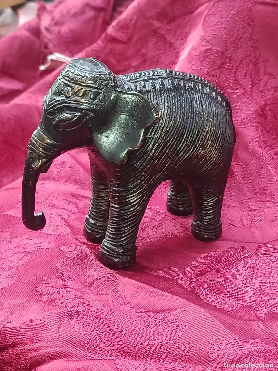 Arte: Escultura de elefante asi&aacute;tico de bronce