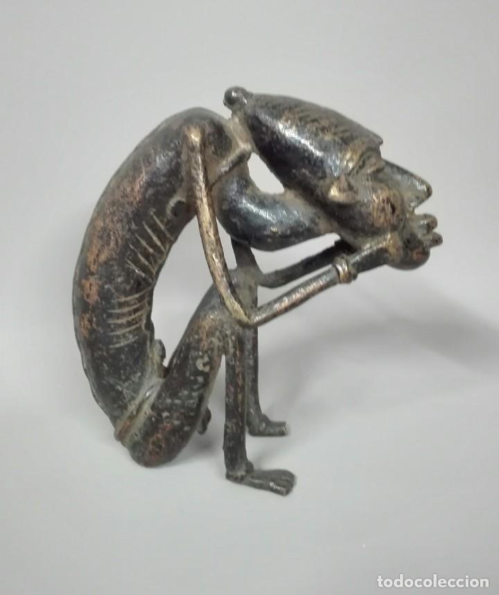 Arte: Africano sentado - Foto 1