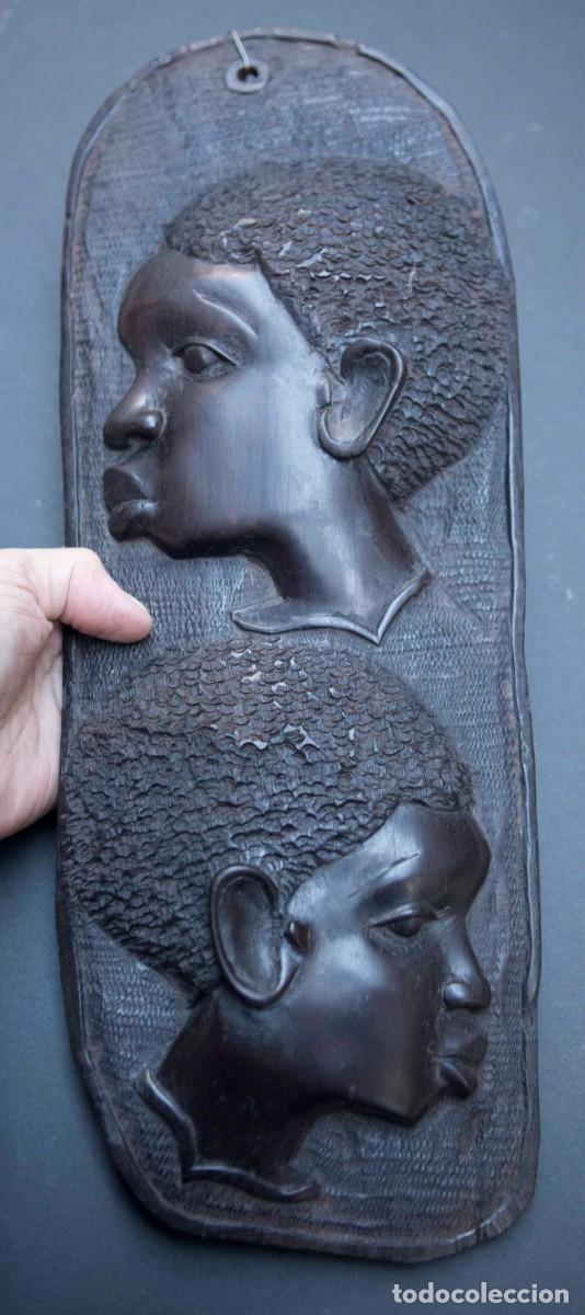 Arte: 2 caras en madera de &eacute;bano. - Foto 1