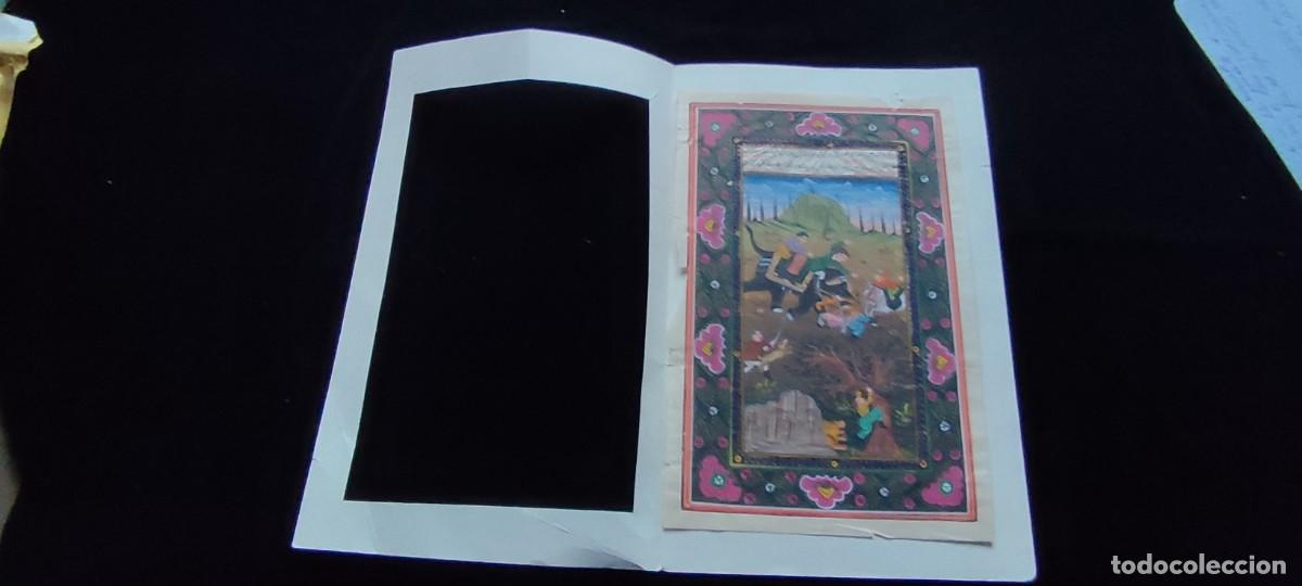 Arte: Antigua muy bella miniatura pintada persa representando la caza de un tigre con elefante