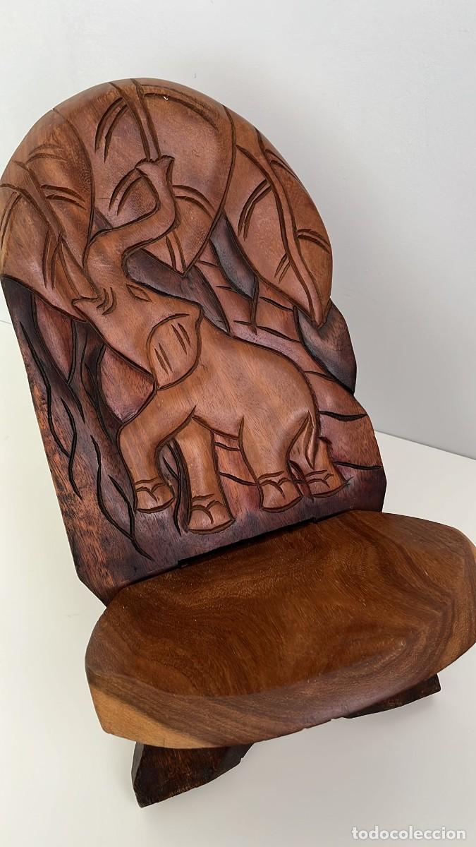 Arte: Silla africana peque&ntilde;a de dos piezas y talla de elefante (Costa de Marfil, 1997)