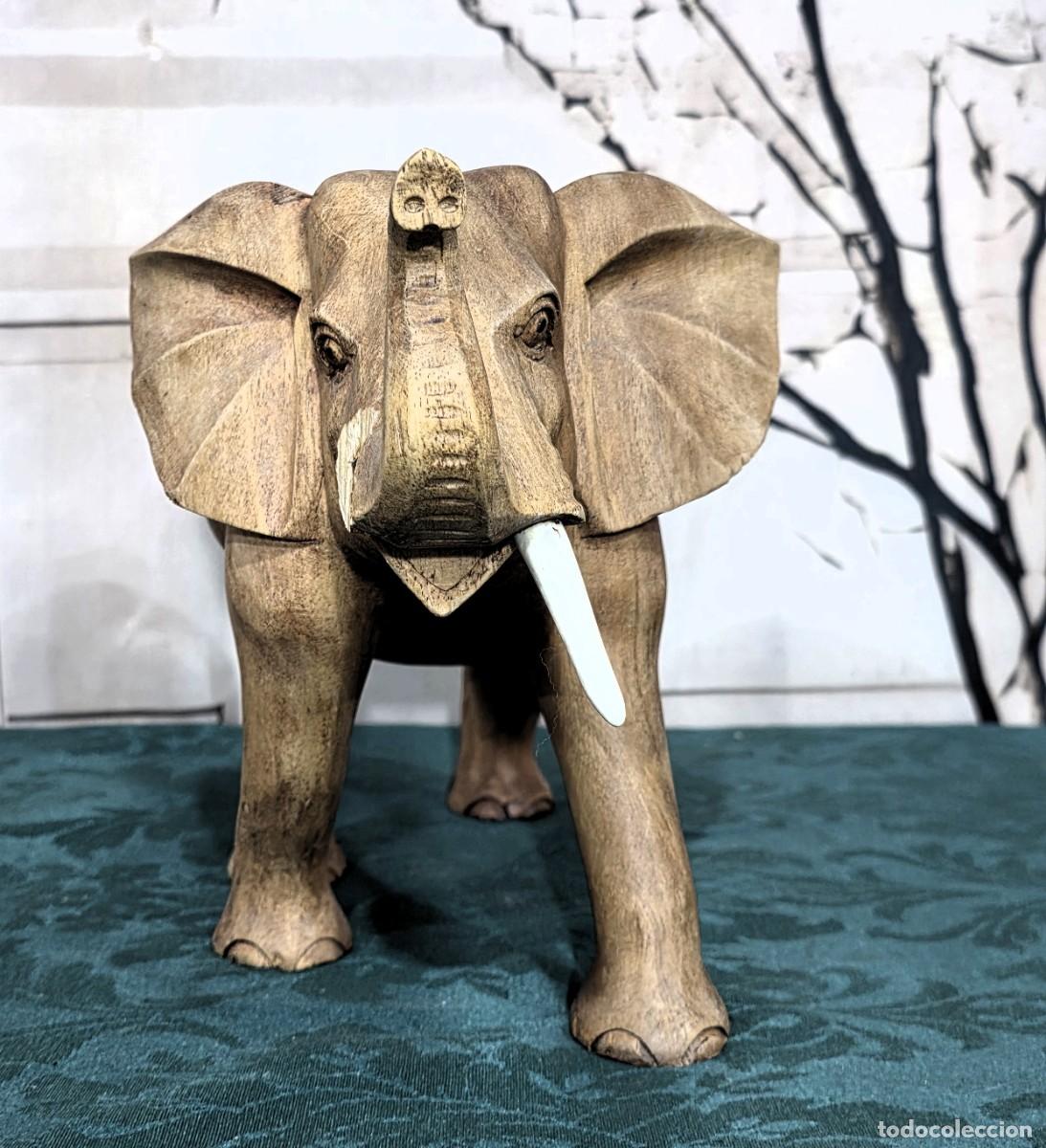 Arte: Elefante de bosque natural tallado a mano