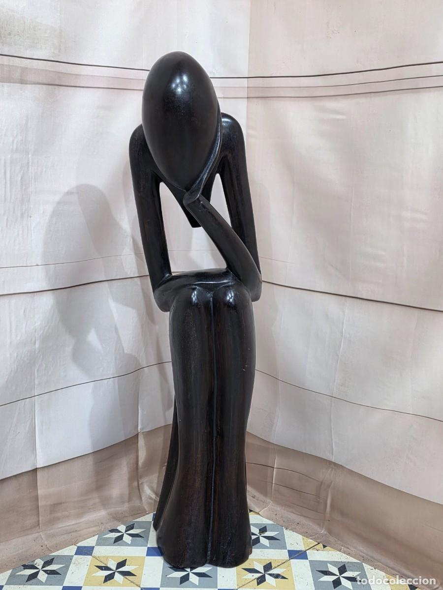 Arte: Escultura de madera tallada a mano