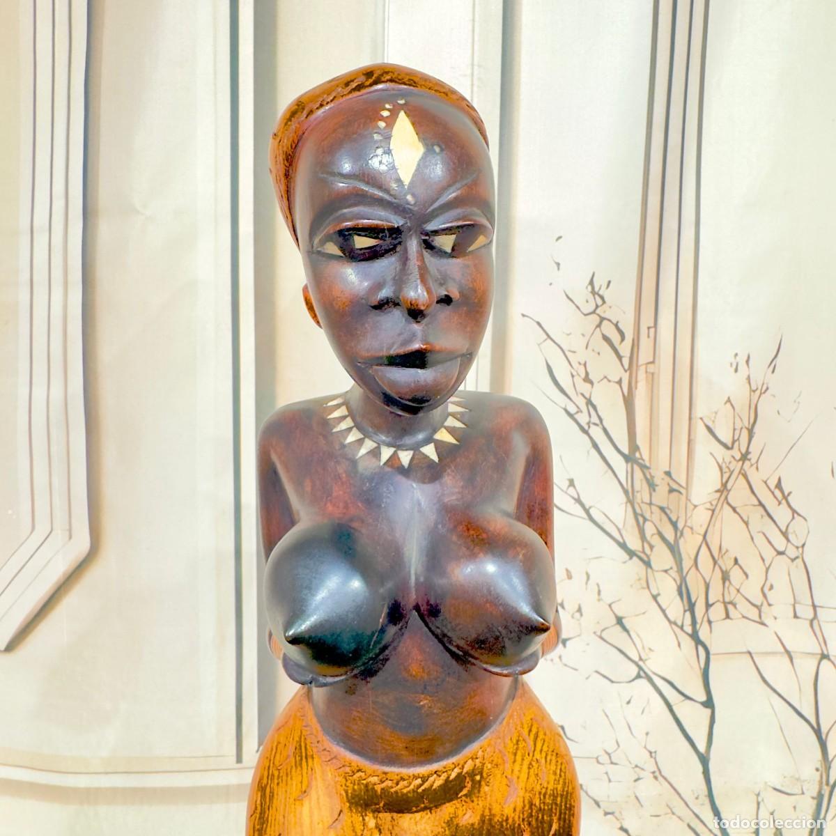 Arte: Escultura de madera tallada a mano