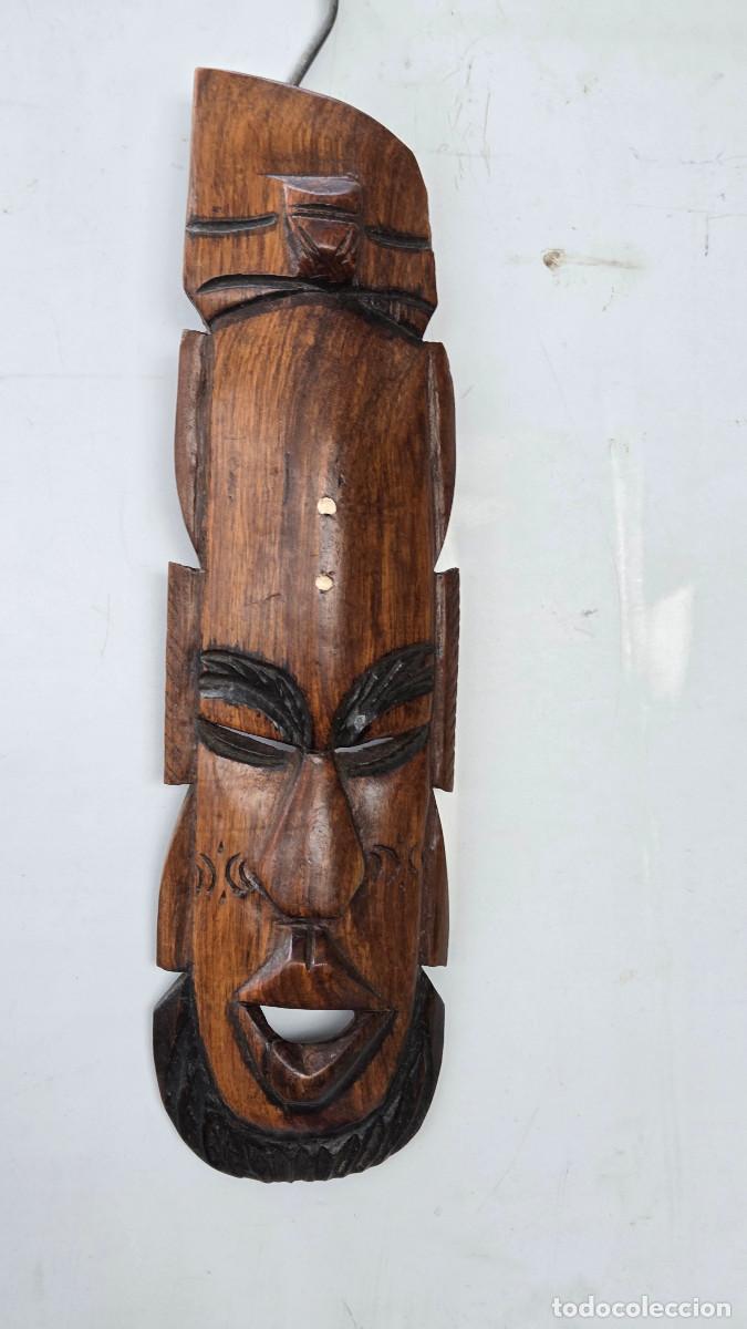 Arte: mascara africana de madera noble