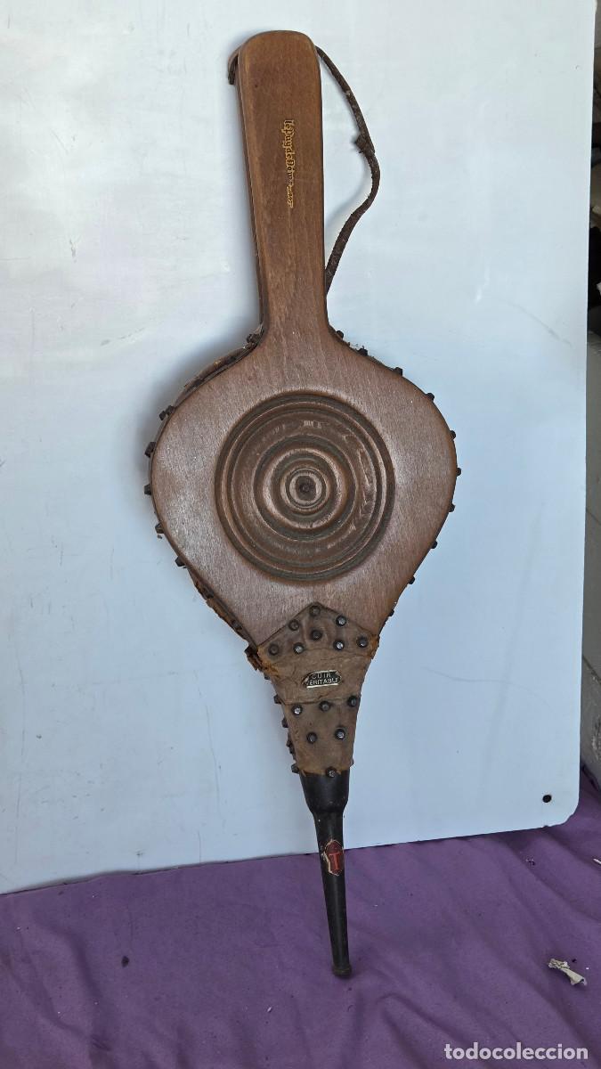 Arte: fuelle de madera para chimenea