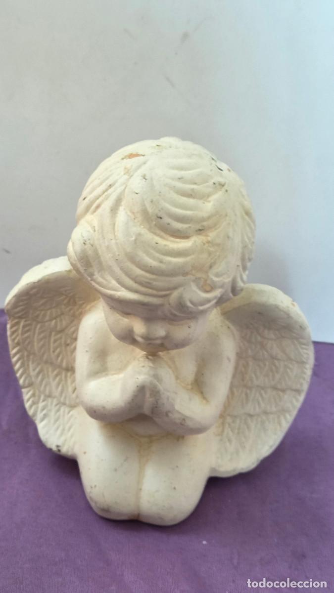 Arte: figura de angel blanco