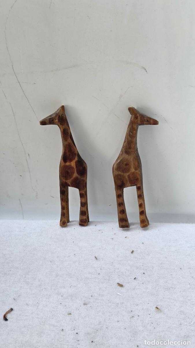 Arte: 2 jirafas de madera peque&ntilde;as