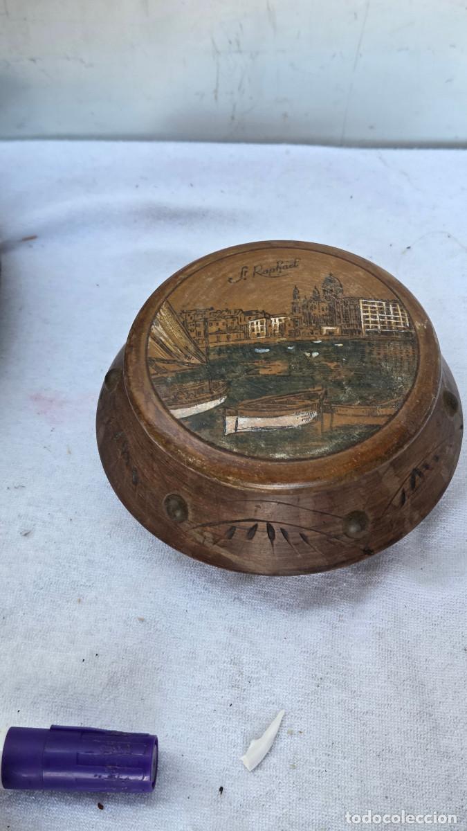 Arte: caja de madera labrada