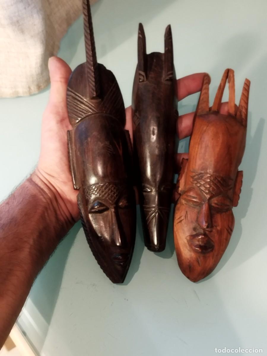 Arte: Conjunto de tres peque&ntilde;as m&aacute;scaras tribales africanas, madera tallada.