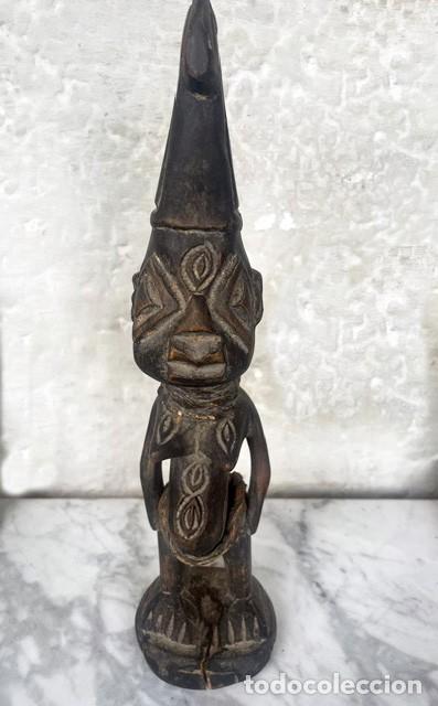 Arte: Ere Ibeji. estatuilla tradicionales de la etnia Yoruba.