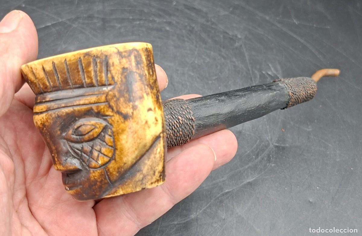 Arte: Pipa ceremonial africana tallada en hueso