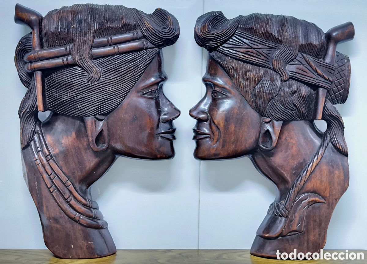 Arte: DOS CABEZAS &Eacute;TNICAS TALLADAS EN MADERA