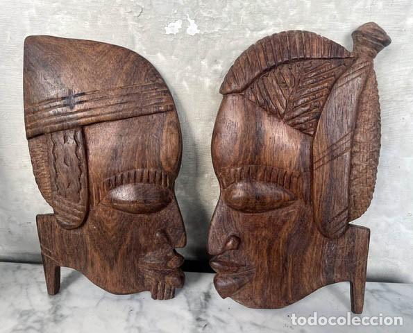 Arte: Pareja de personajes africanos tallados en madera de &eacute;bano