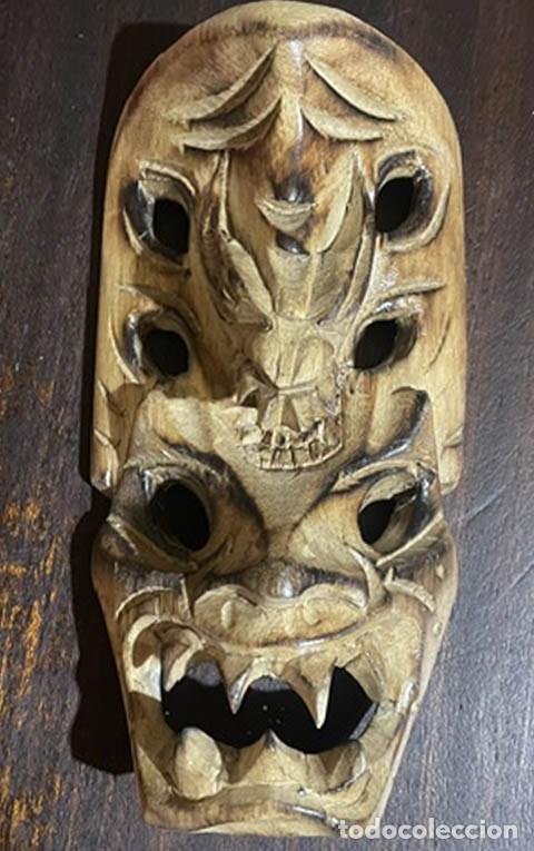 Arte: M&aacute;scara tribal de Bakunawa,originaria de las Filipinas