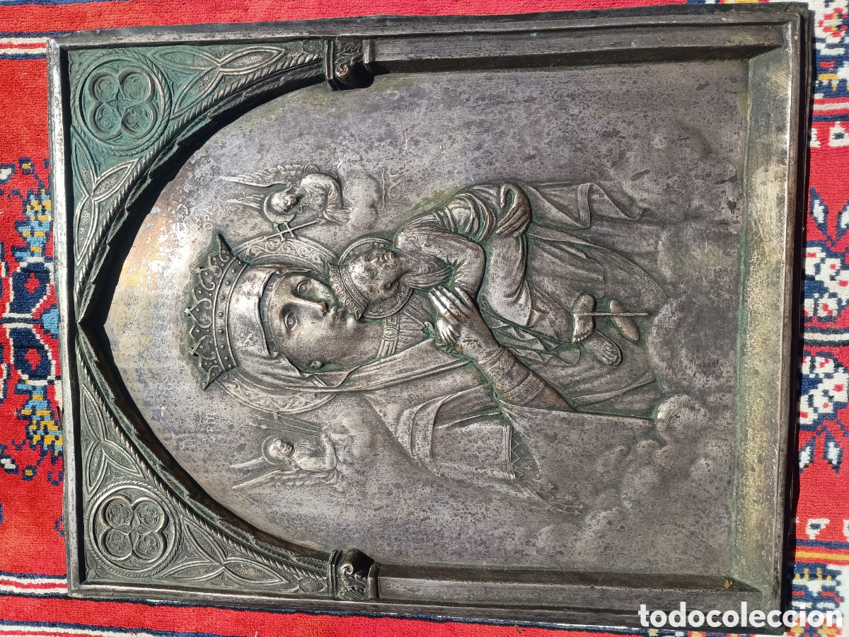 Arte: Placa virgen y ni&ntilde;o metal