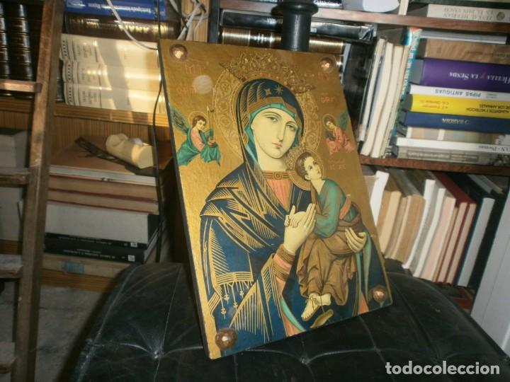 Art: Cuadro l&aacute;mina virgen sobre madera 4 clavos medida 37 X 27 cm.