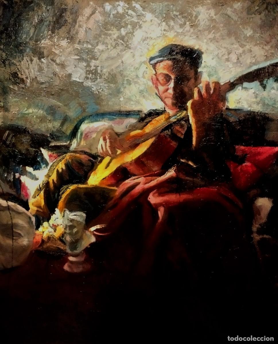Arte: Guitarrista tocando la guitarra