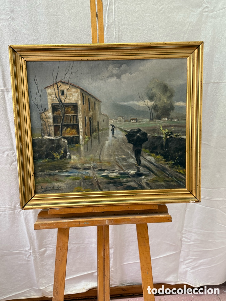 Art: E. Serrat Calv&oacute;. Paisaje rural con lluvia y figuras con paraguas. &Oacute;leo sobre lienzo firmado.
