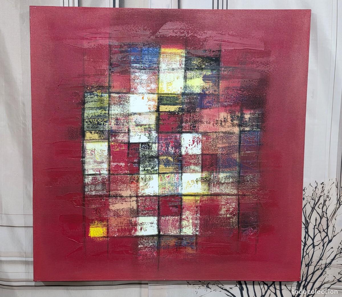 Arte: Pintura abstracta texturizada en tonos rojos con detalles en relieve.