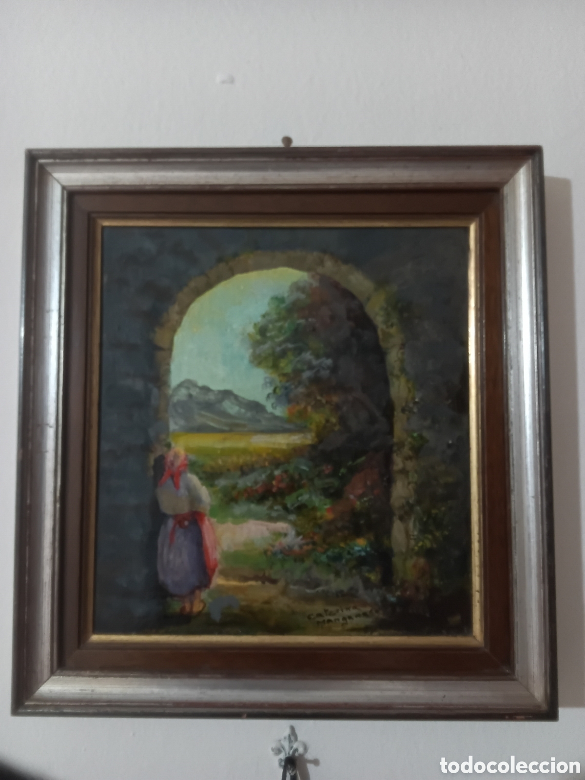 Arte: Vista a trav&eacute;s del arco de piedra