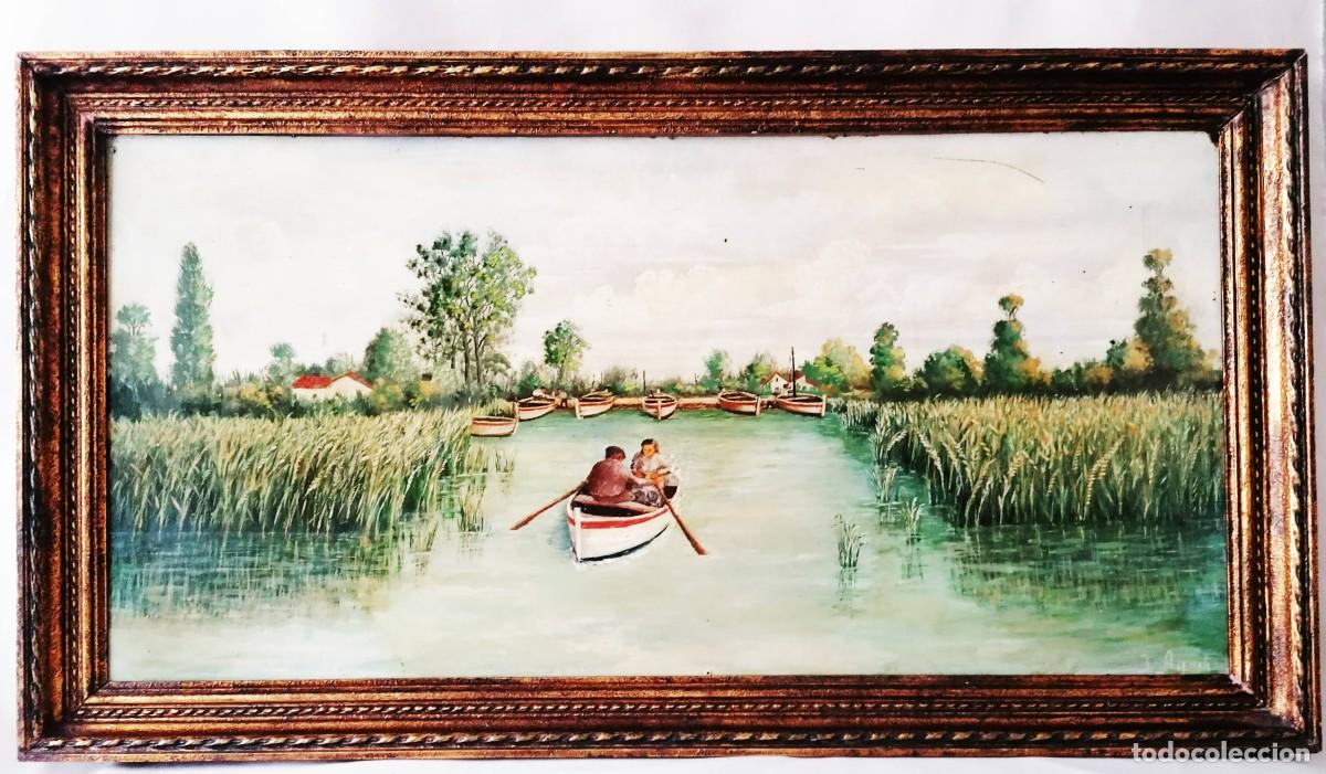Arte: Paisaje de marisma con barcos de pesca tradicionales