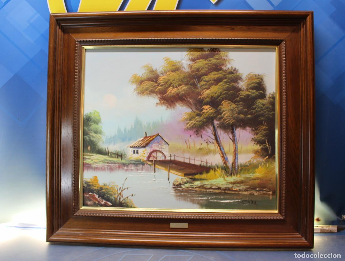 Arte: 17. &Oacute;leos sobre lienzo, V. Soler. Paisaje con r&iacute;o.