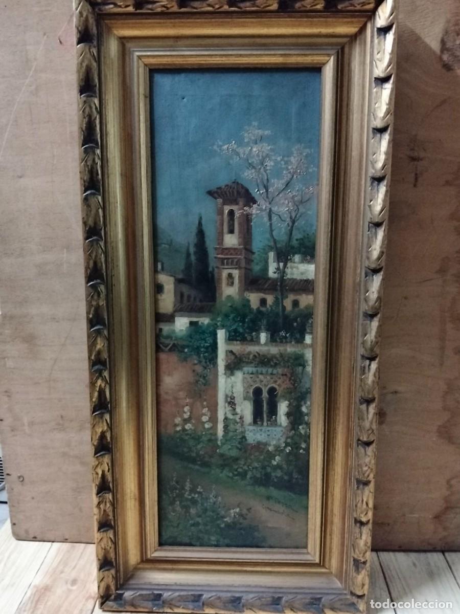 Arte: Oleo sobre lienzo enmarca en marco de madera tallada, acabado dorado. Firma M@ Magra? Granada