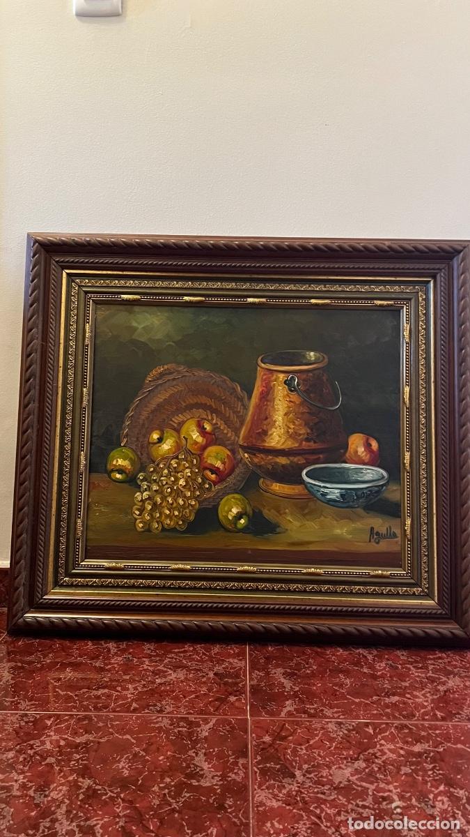 Arte: Bbodeg&oacute;n al &oacute;leo con marco dorado tallado