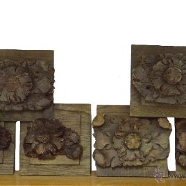 Antiguas tallas, rosetones, madera de nogal en base de roble,S. XVI