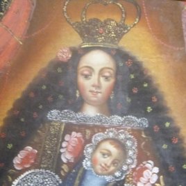 Cuadro Cuzqueño pintura al oleo sobre tabla de la Virgen con el Niño Jesús. en su marco.