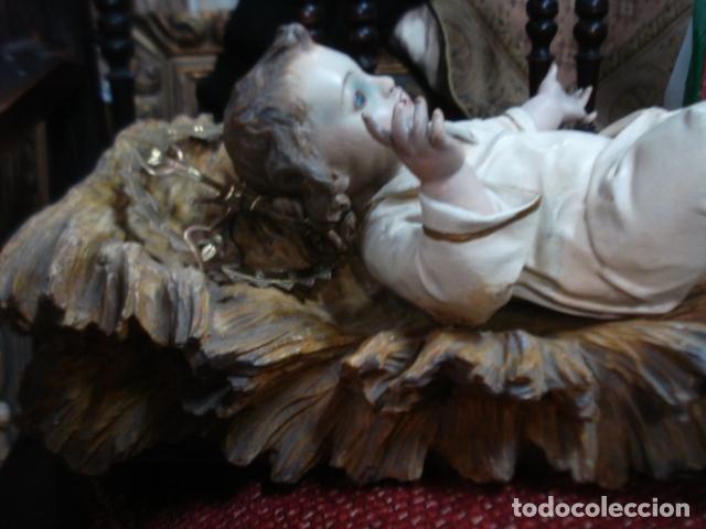 Arte: NI&Ntilde;O JES&Uacute;S Y CUNA DE TALLA DE MADERA SXIX CON OJOS CELESTES