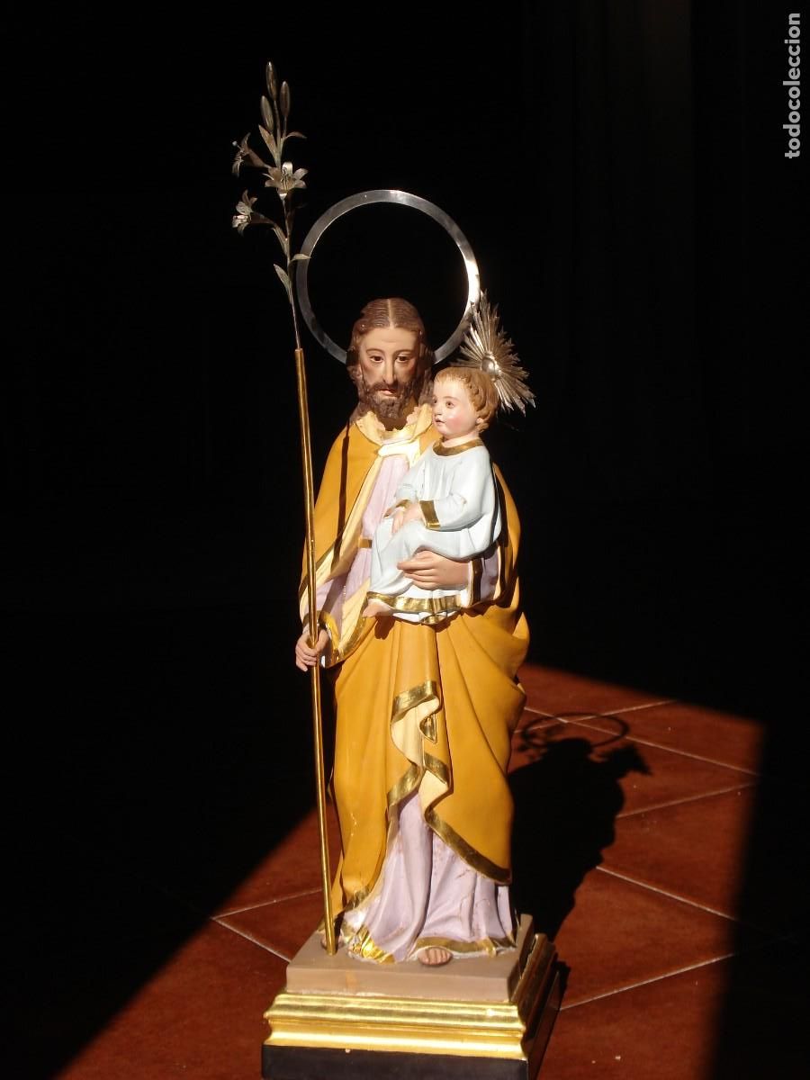 Arte: SAN JOSE CON NI&Ntilde;O TALLA AUREOLAS Y AZUCENA DE PLATA SXIX