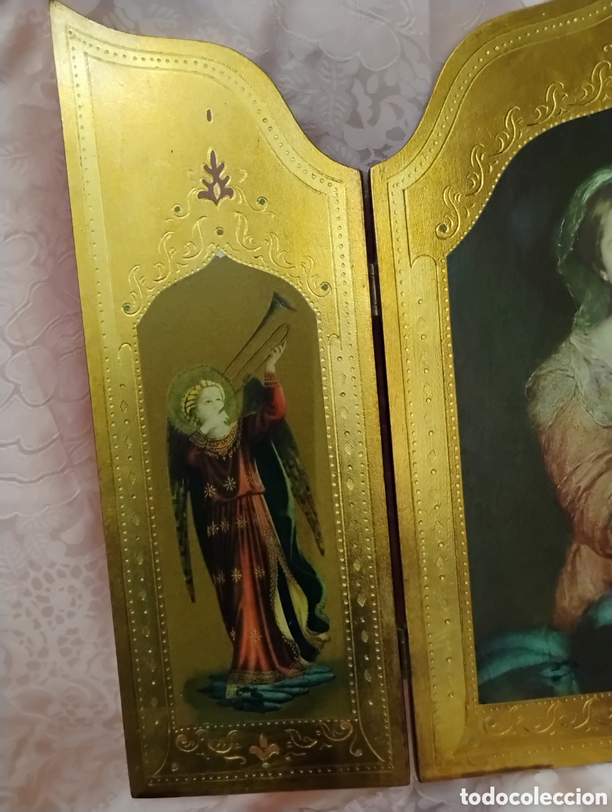 Arte: Se trata de un tr&iacute;ptico de tem&aacute;tica religiosa que representa a la Virgen Mar&iacute;a, en el panel central. - Foto 6