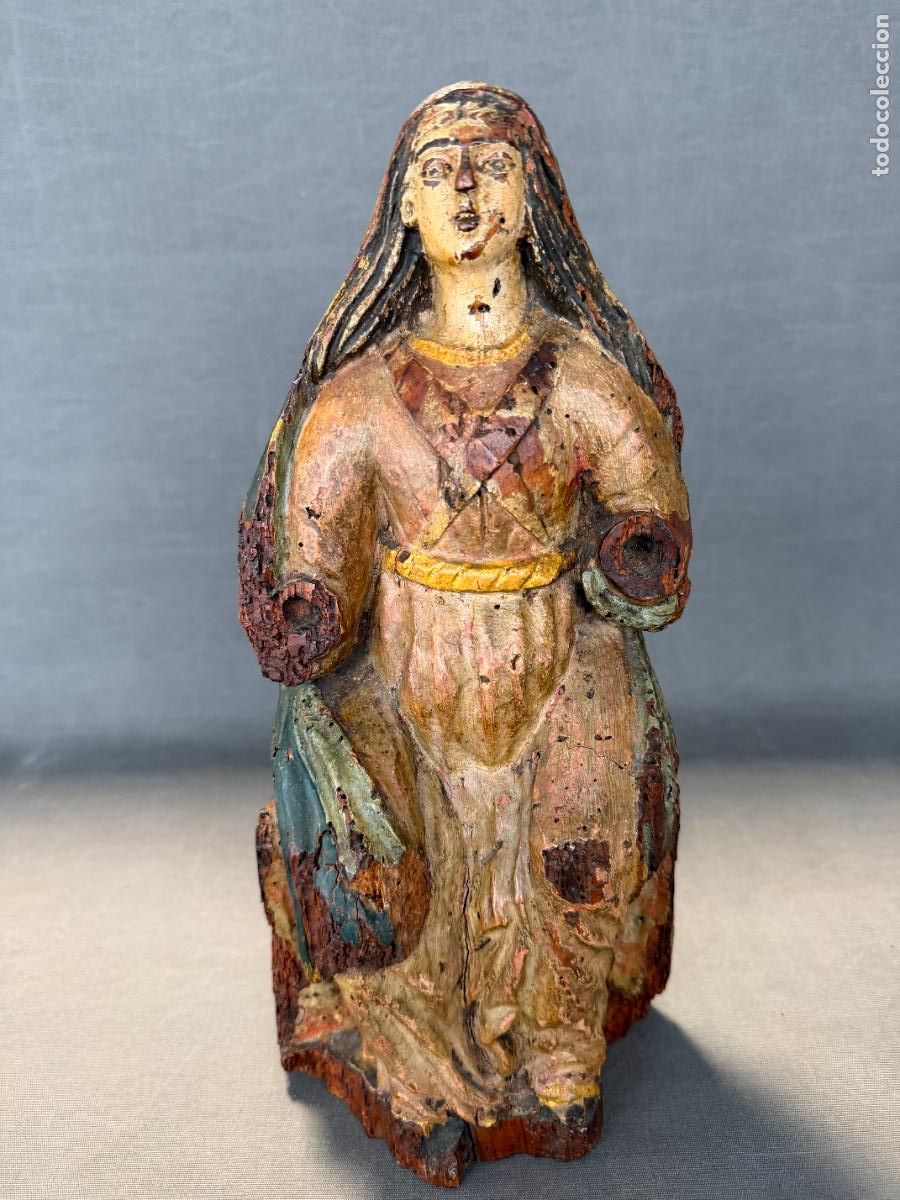 Arte: Virgen sedente escuela Portuguesa S. XVIII , madera tallada y policromada , R669