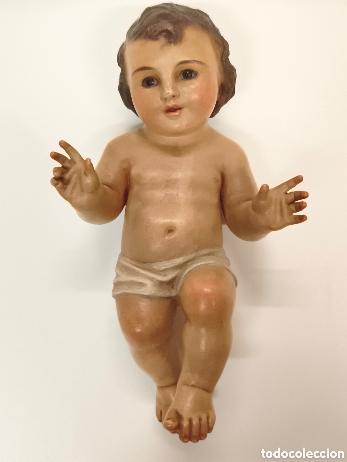Arte: Ni&ntilde;o Jes&uacute;s de cuna tallado en madera