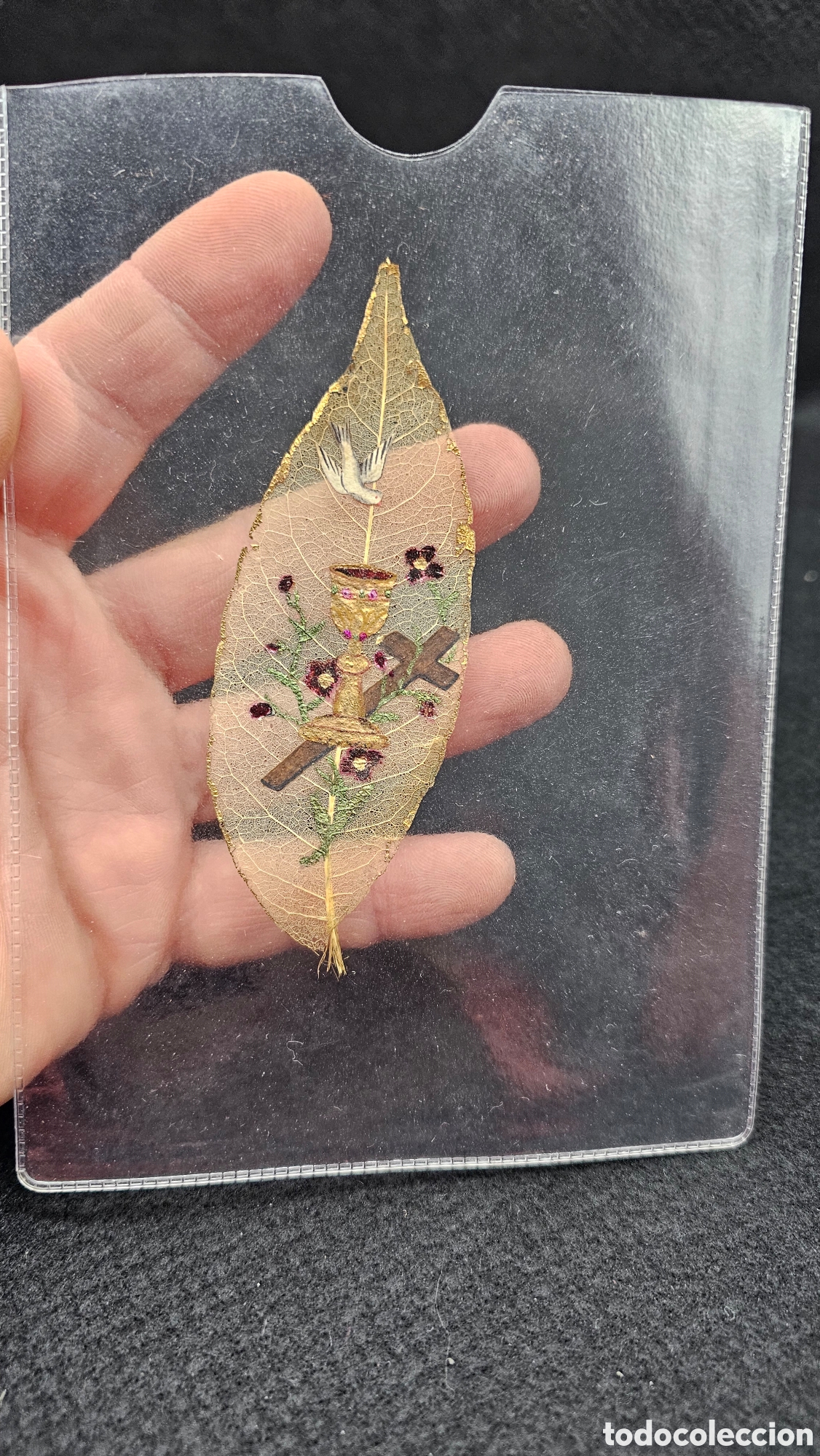 Arte: Antigua obra de arte religiosa sobre hoja