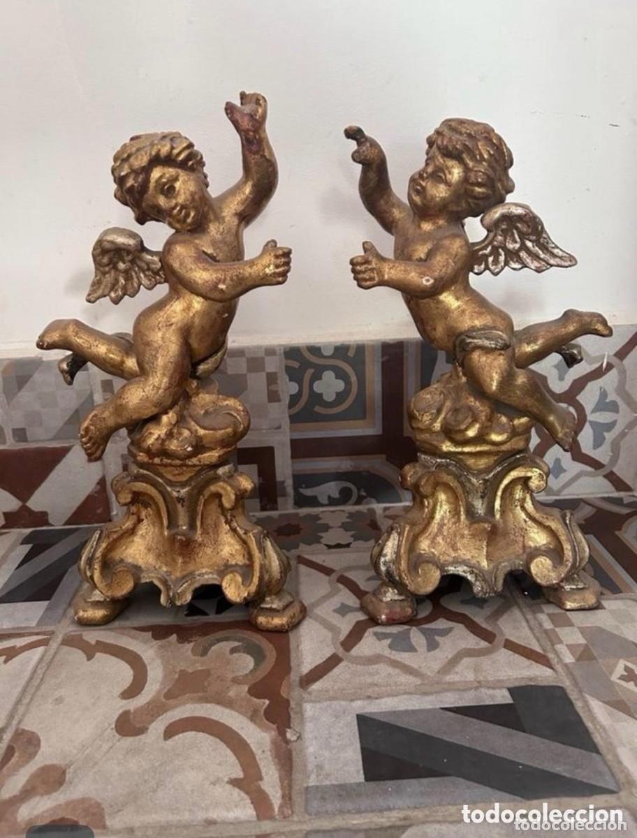 Kunst: Pareja de &Aacute;ngeles tallados
