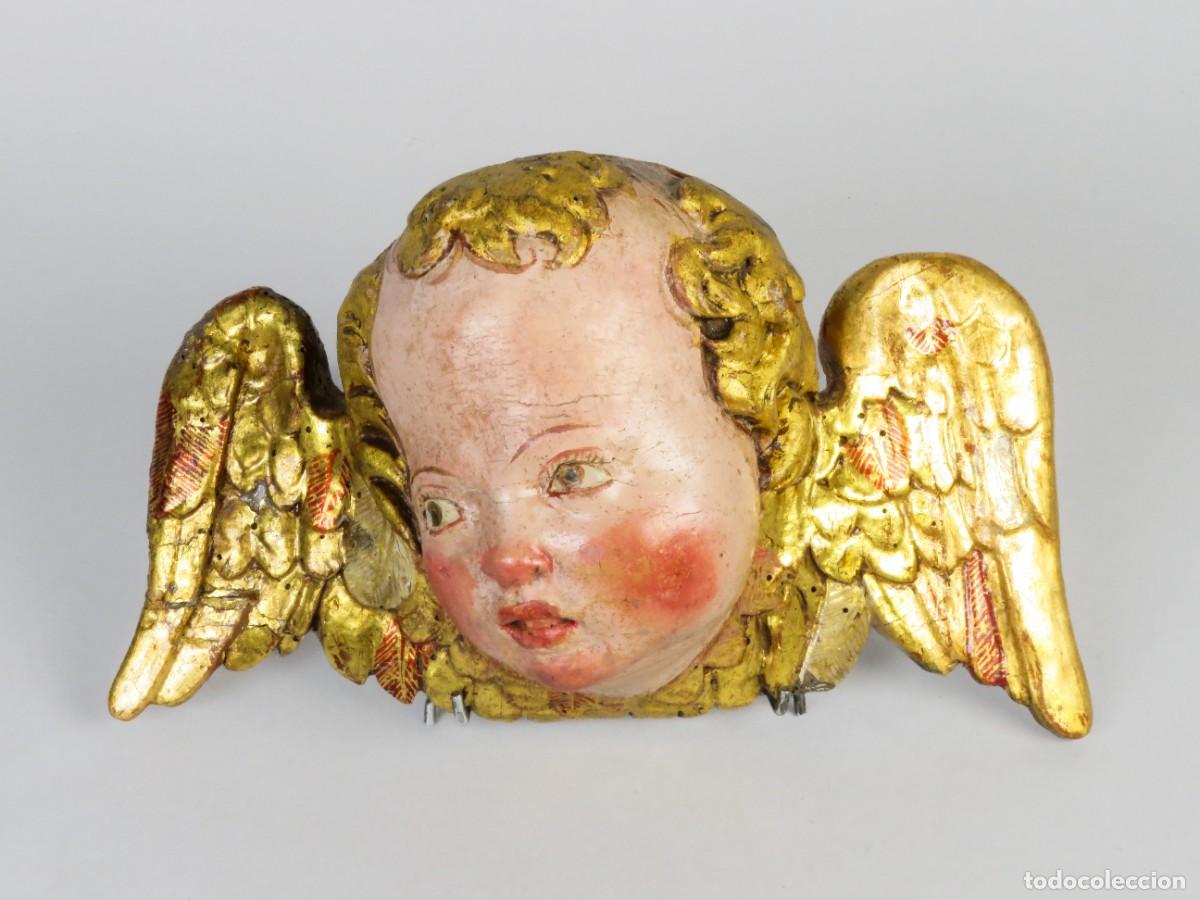 Arte: Cabeza de &aacute;ngel Querubin talla en madera policromada y dorada escuela espa&ntilde;ola siglo XVI