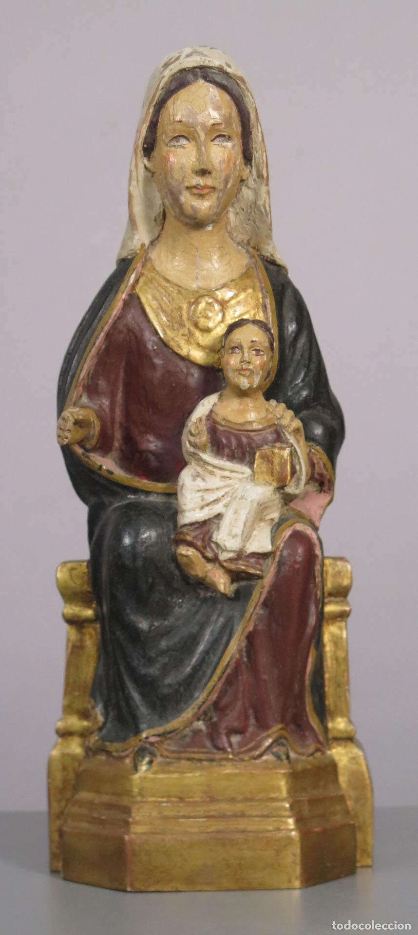 Arte: VIRGEN SEDENTE. MADERA DE ROBLE POLICROMADO Y PAN DE ORO. HACIA 1940