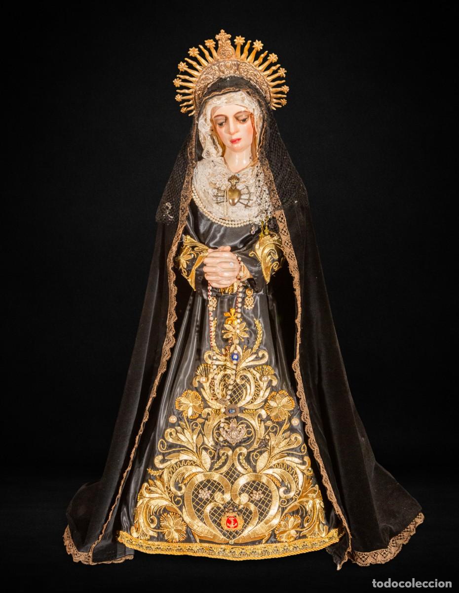 Arte: Virgen Dolorosa de vestir antigua. Escuela espa&ntilde;ola siglo XVIII. Corona de plata. 149 cm