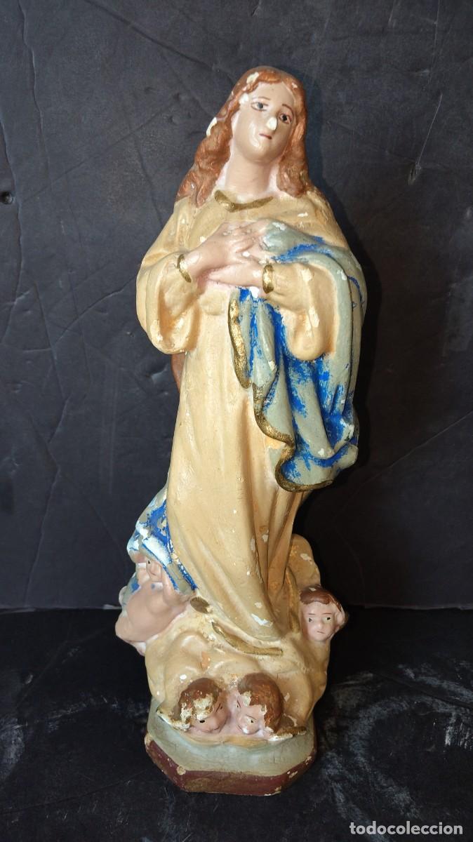 Arte: Inmaculada, Antigua imagen de estuco policromado