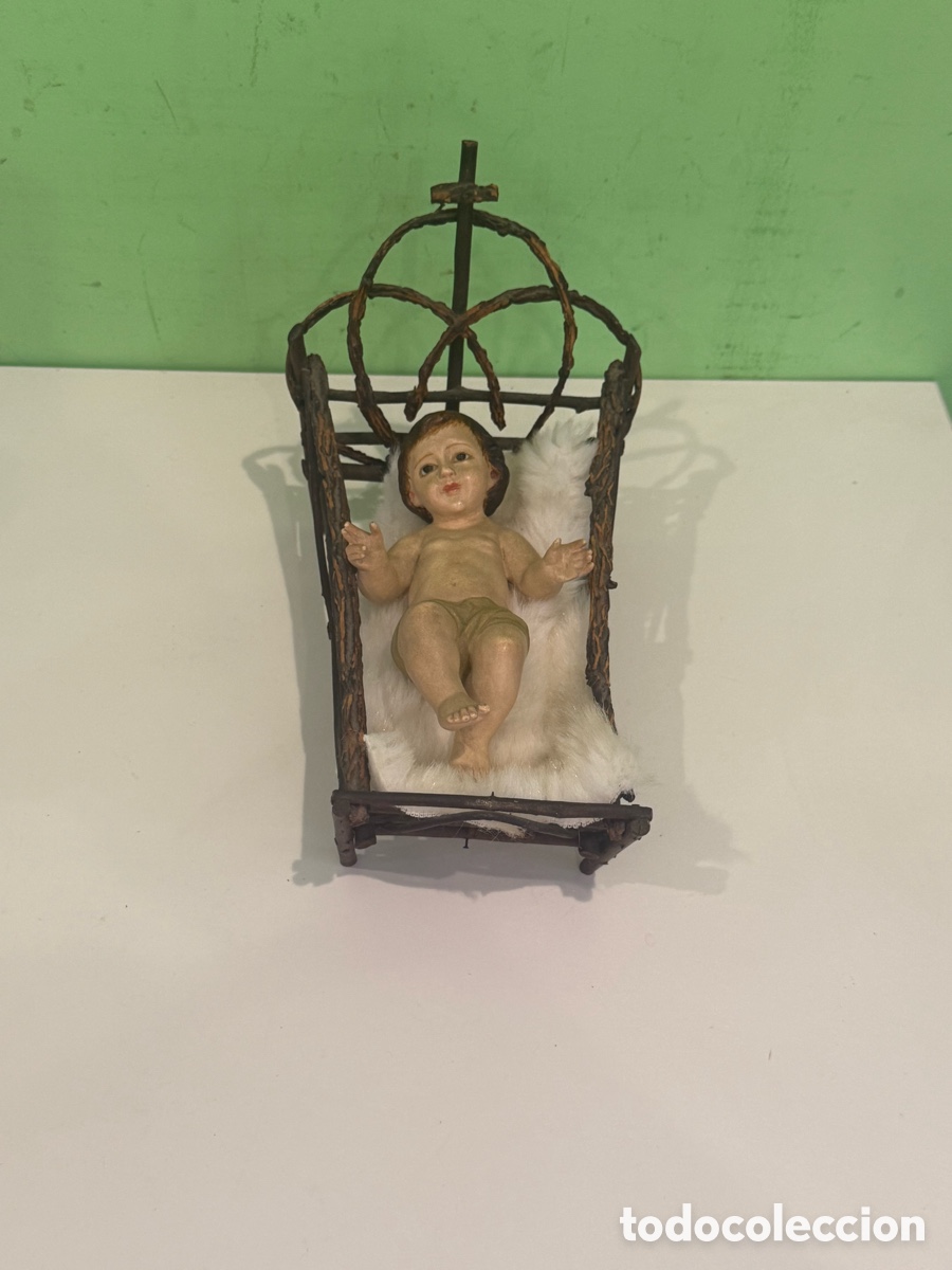 Arte: Jes&uacute;s antiguo en cuna artesanal de madera y ramas &ndash; Arte religioso siglo XX