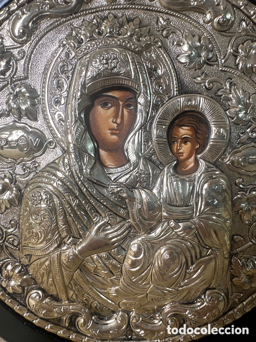 Arte: Icono de religioso de plata enmarcado en madera. Rusia.