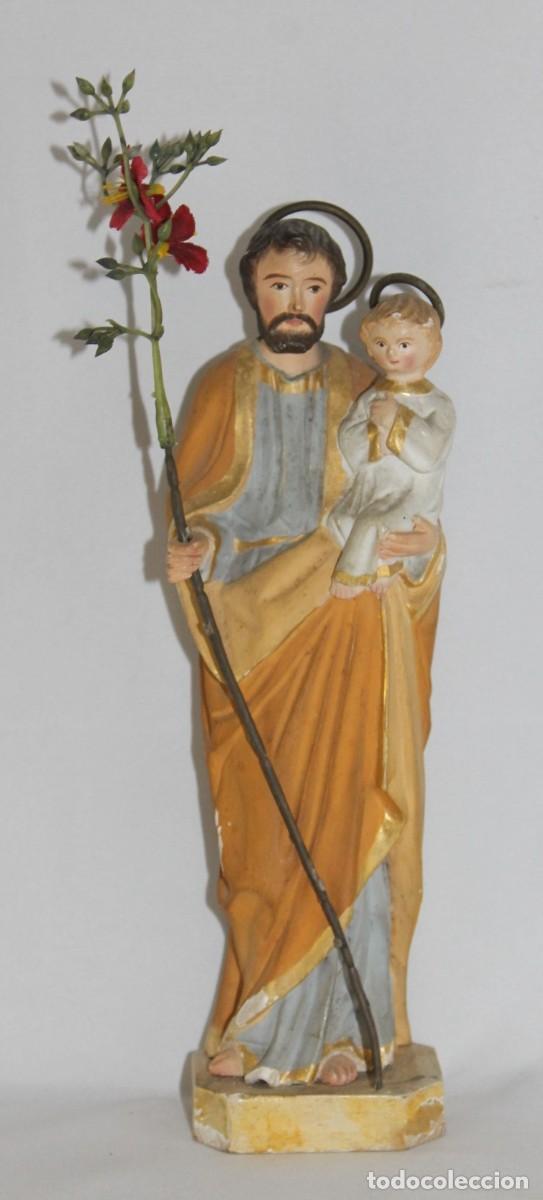 Arte: Antigua talla de San Jos&eacute; con el Ni&ntilde;o. Madera tallada y policromada.
