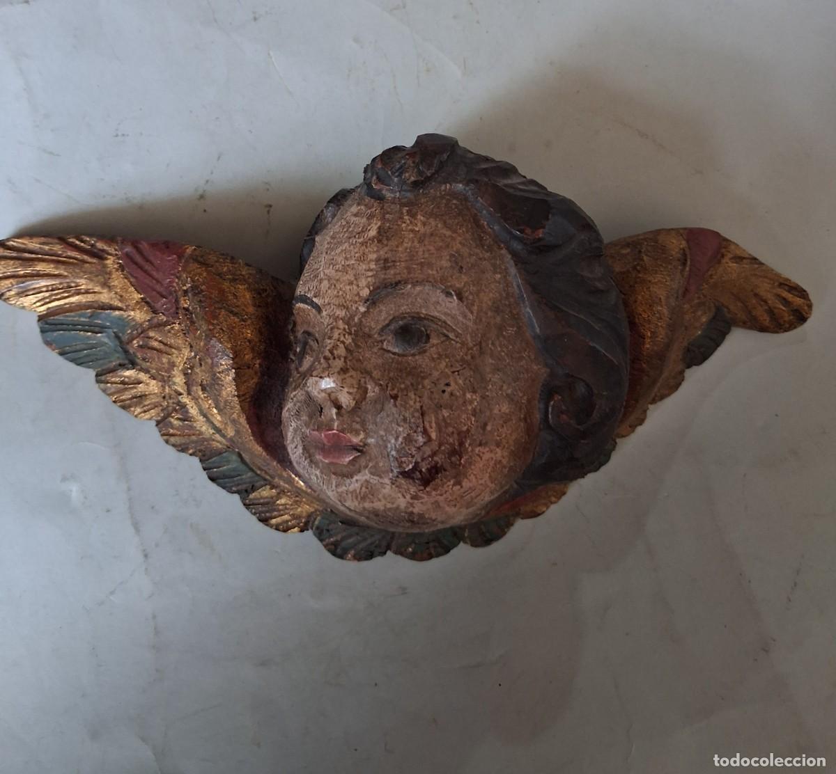 Arte: Cabeza de querubin Talla de madera