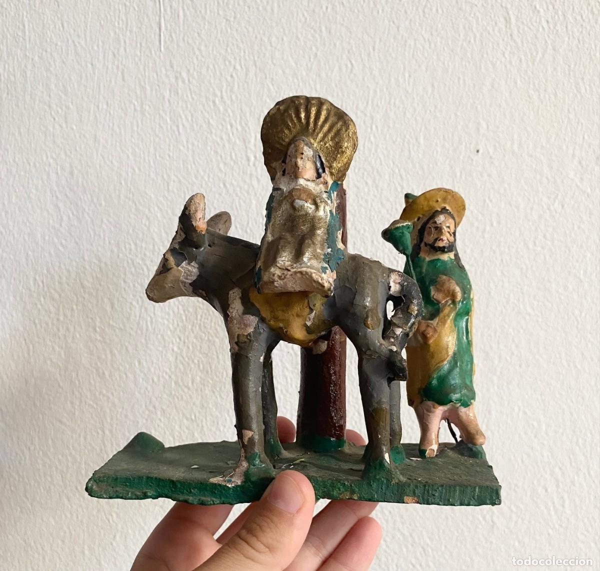 Arte: San Jos&eacute; y Virgen Mar&iacute;a en burro, huida de Egitpo, escultura popular de terracota, siglo XIX.