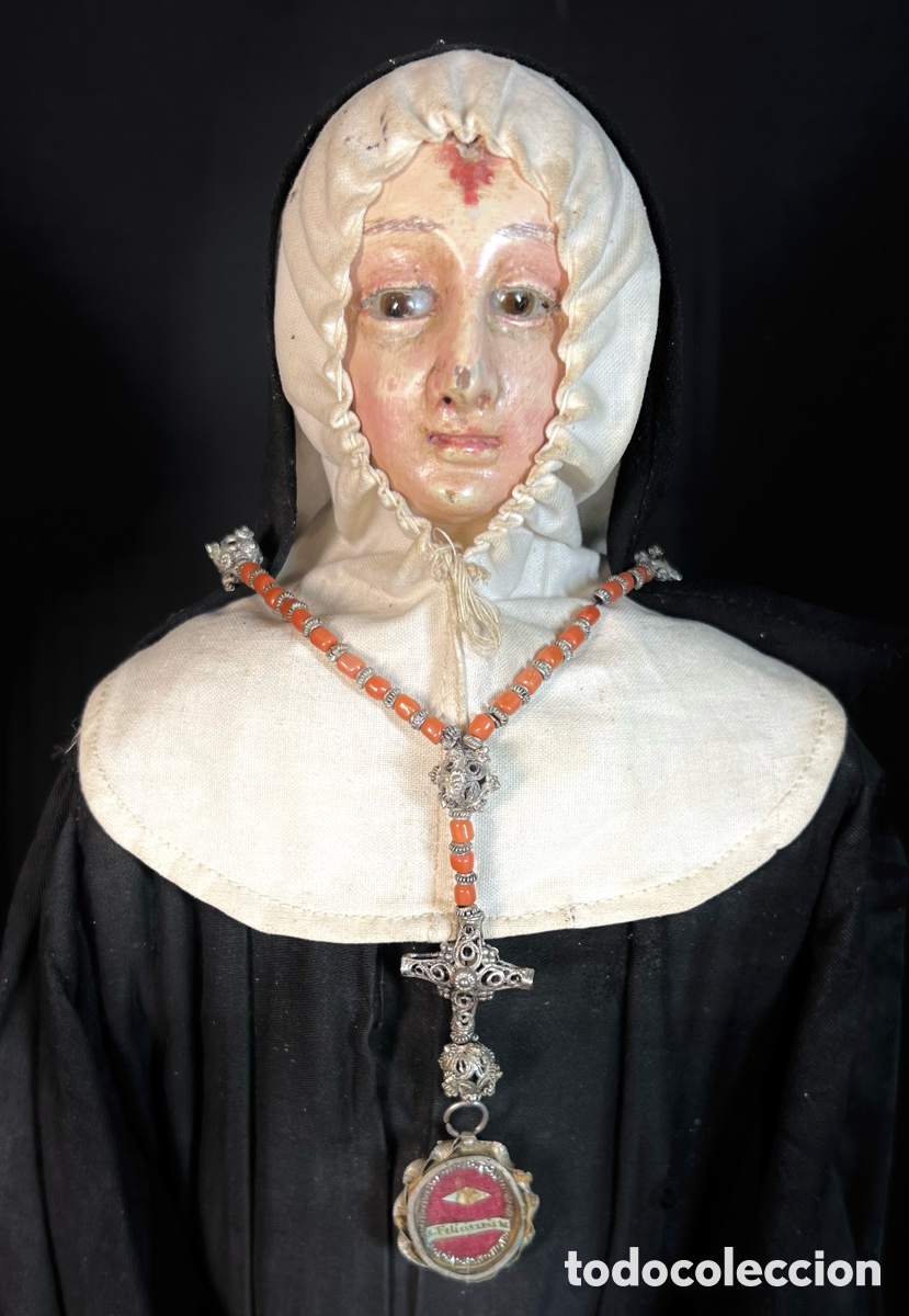 Arte: Santa Rita. Madera, 70 cm.