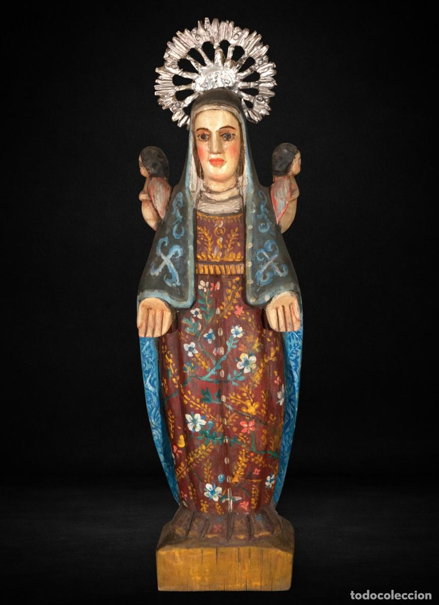 Arte: Virgen de Guatemala con &aacute;ngeles, madera policromada, primera mitad s. XX